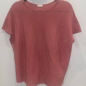 Salmon colored top from Drykorn